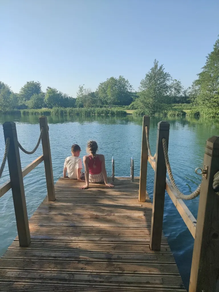 Kids on a lake dock